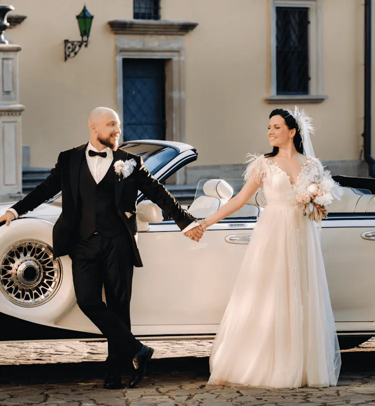 Just Married Couple Posing for Wedding Photo Next to Vintage Car - 8class